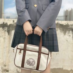 小熊刺绣制服包-资料图