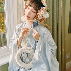 花间狸奴·手提包-资料图