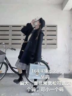A字版牛角扣大衣-资料图