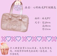 爱心粉红手提珠光包-资料图