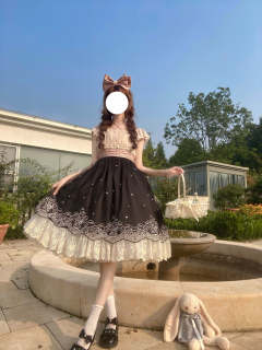 摘铃兰的小熊-资料图