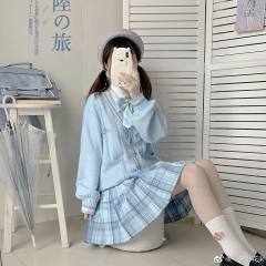 白藏蝶雨毛衣开衫-资料图